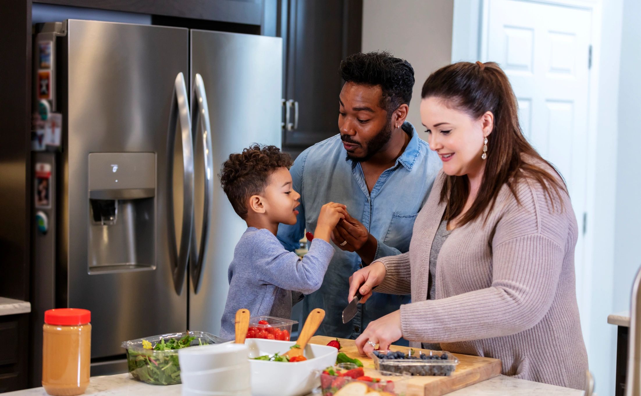 Family enjoying time together in the kitchen