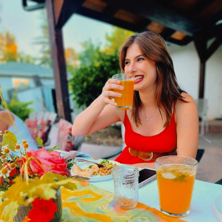 Woman eating at table